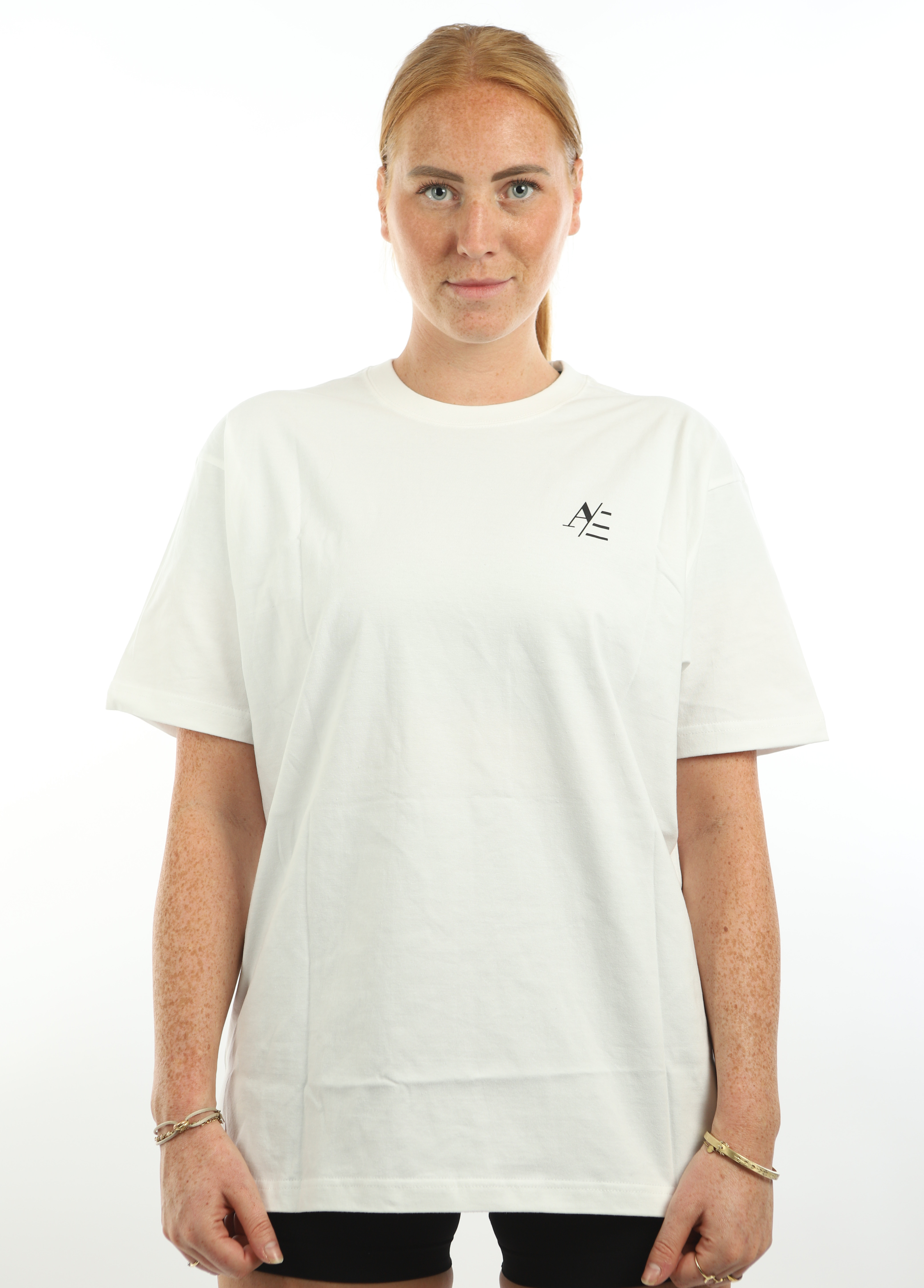 Oversized T-Shirt Porcelain White TRAIN HARD, STAY MOTIVATED.
